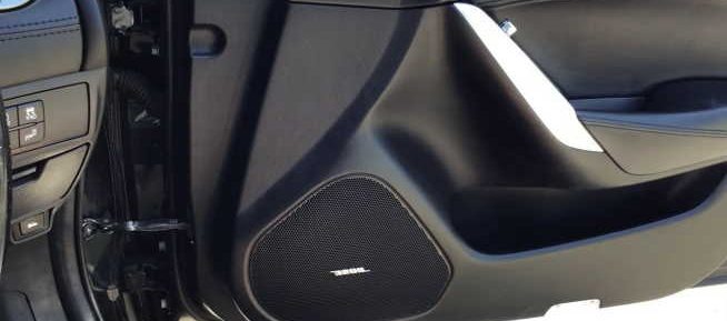 How do you fix a rattling car speaker?